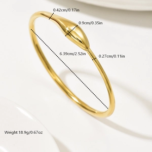 Detailed view of gold plated stainless steel bangle with precise size and weight dimensions