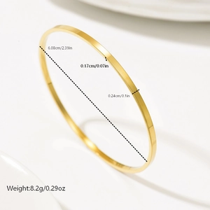 Detailed view of gold minimalist bangle showing 2.39 inch inner diameter and polished finish