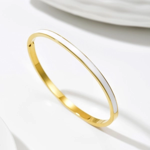 Minimalist 14k gold plated stainless steel oval bangle with white enamel inlay and hinge