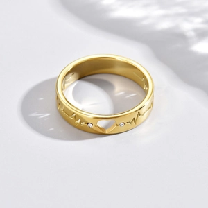 Golden stainless steel heart rate ring with heart cutout and zircon stones for lovers