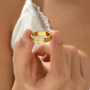 Gold stainless steel heart and heartbeat ring featuring sparkling zircon accents