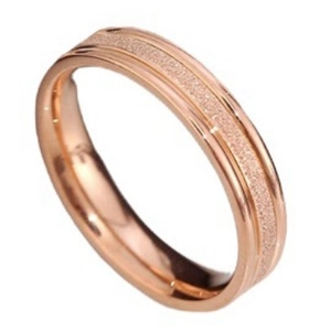 Minimalist rose gold titanium steel ring with a frosted texture and polished edges