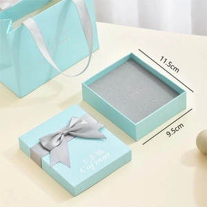 Set de caja de regalo para joyas azul claro con lazo y ranuras de terciopelo