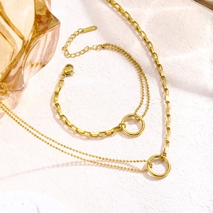 Golden stainless steel necklace and bracelet set with circular link and dual chain design