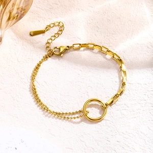 Minimalist gold asymmetrical titanium bracelet with geometric links and circular ring