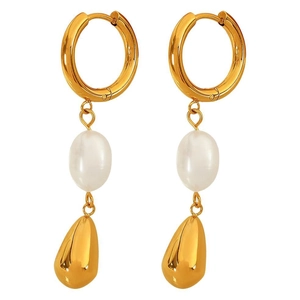 Vintage style gold earrings featuring freshwater pearls and shiny metallic teardrop pendants