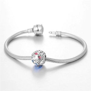 S925 Sterling Silver charm bracelet with Russian bird bead and red enamel details