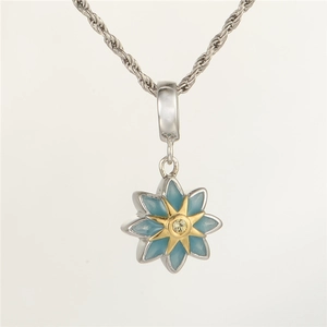 Detailed view of S925 silver flower pendant with blue petals and golden star center