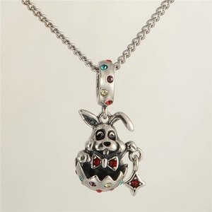 Macro view of S925 sterling silver Easter bunny pendant with colorful rhinestones detail