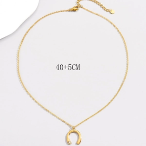 Gold U-shaped horseshoe pendant necklace in stainless steel with crystal accent, 45cm