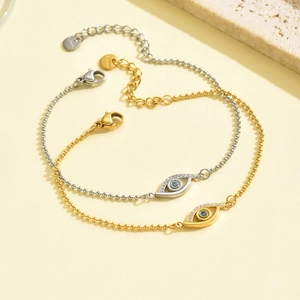Titanium steel Evil Eye bracelet with blue crystal and pave stones in gold and silver