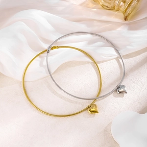 Minimalist heart pendant necklaces in gold and silver finish with polished snake chains