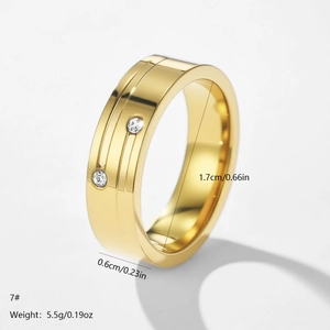 Polished gold stainless steel ring with dual grooves and inset round diamonds