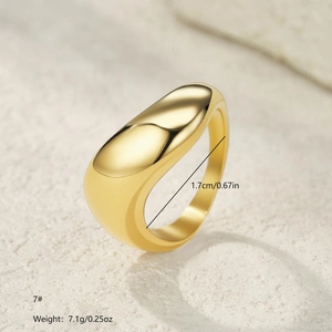 Polished minimalist wide band gold-plated stainless steel ring with fluid wave design