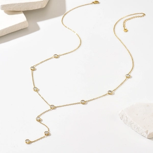 Elegant gold Y-shaped station necklace with round cubic zirconia and adjustable chain