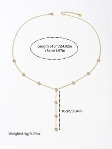 Detail of gold Y-shaped necklace with nine round zircon accents and dimensions shown