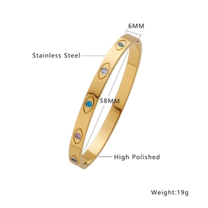 18K gold-plated stainless steel evil eye bangle with colorful gemstones and high polish