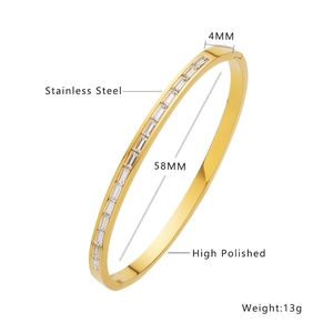 Macro shot of 4mm gold stainless steel bangle with rectangular zircon inlay details