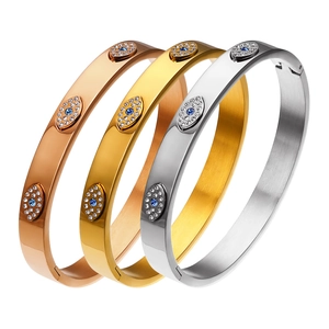 Titanium steel Evil Eye bangle set in gold, rose gold and silver finish with blue crystal