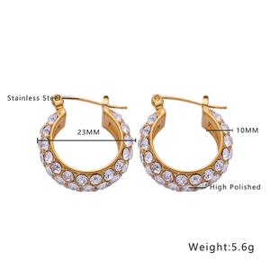 Detailed view of 23mm stainless steel gold hoop earrings with paved cubic zirconia stones