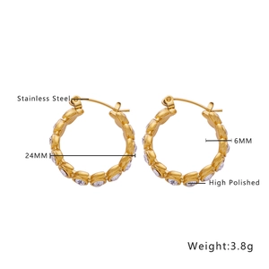 Detail of 24mm 18k gold plated stainless steel hoop earrings with clear cubic zirconia
