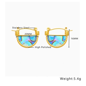 Detailed view of gold plated stainless steel hoop earrings with shell inlay and twist texture