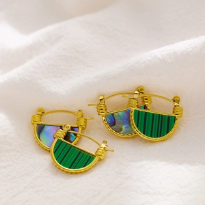 Detail of vintage gold earrings with malachite and abalone shell inlays and wire wrapping