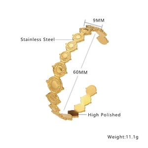 Bracelet jonc ouvert en acier inoxydable plaqué or 18k avec motif soleil poli
