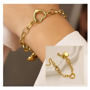 Detail of 18k gold plated heart bracelet showing vacuum plating and mirror polishing