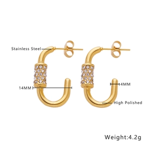 Detailed view of gold stainless steel U-shaped earrings with white zircon inlays