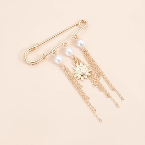 Vintage golden safety pin brooch with white pearls, sun face pendant and long chain tassels