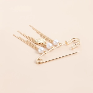Vintage gold brooch pin with sun flower pendant, white pearls and tassel chain detail