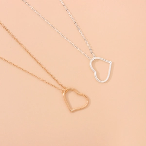 Sleek gold and silver heart pendant belly chains with minimalist links for women