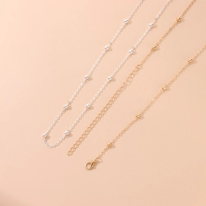Minimalist gold and silver beaded waist chain set for beachwear and bikini fashion