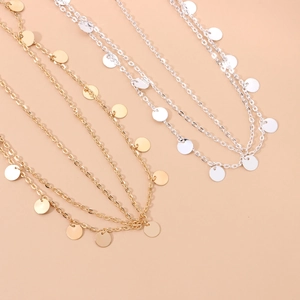 Multilayer chain necklace set with shiny circular sequin pendants in gold and silver
