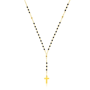 Long Y-shaped gold rosary necklace with black beads and a cross pendant on white back