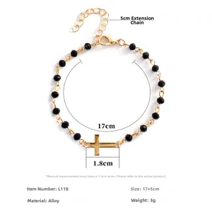 Cross pendant beaded bracelet with black faceted stones and gold chain 17cm