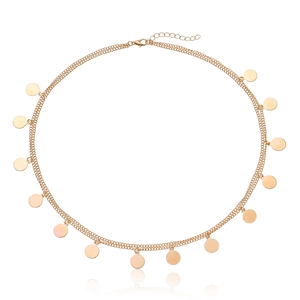 Detail of double-layer gold chain headband featuring round sequins and adjustable lobster clasp
