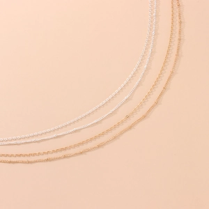 Sexy minimalist body belly bikini waist chain with gold and silver bead chain layered design