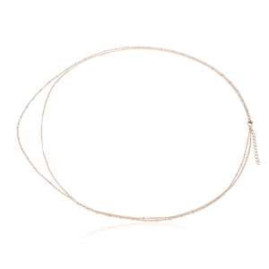Detail of delicate gold waist chain with blue eye beads and lobster clasp closure