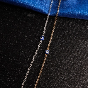 Minimalist evil eye bracelets in gold and silver finish with Turkish blue enamel charms