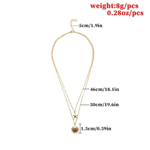 Gold-layered necklace with starfish and shell pendants showing detailed dimensions