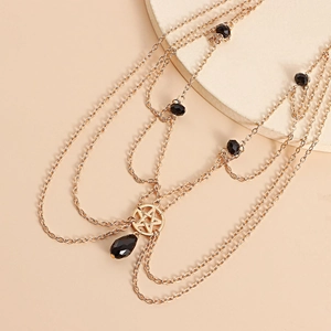 Bohemian gold layered hair chain with black crystal beads and pentagram star pendant