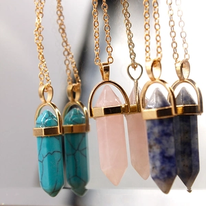 Golden layered necklace set with hexagonal crystal stone pendants in multiple colors