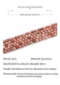 Dettaglio macro di perle in thulite naturale da 8mm con specifiche di lunghezza di 380mm