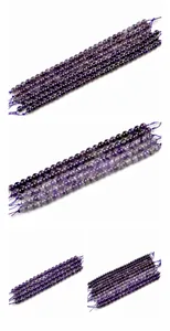 Detail of 6mm natural amethyst beads showing authentic ice crack textures and deep purple hues