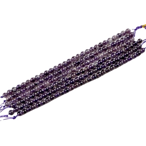 Perles rondes en améthyste naturelle 6mm pour création de bijoux sur fond blanc