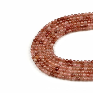 Polished 6mm natural strawberry quartz beads for jewelry making on white background