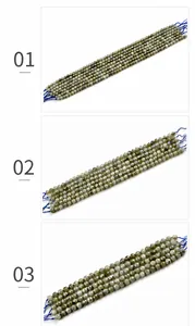 Makroaufnahme von facettierten Labradorit-Perlen für DIY-Schmuck auf weißem Grund