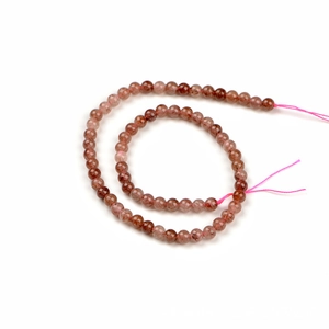 6mm natural strawberry quartz round beads for DIY jewelry making on white background